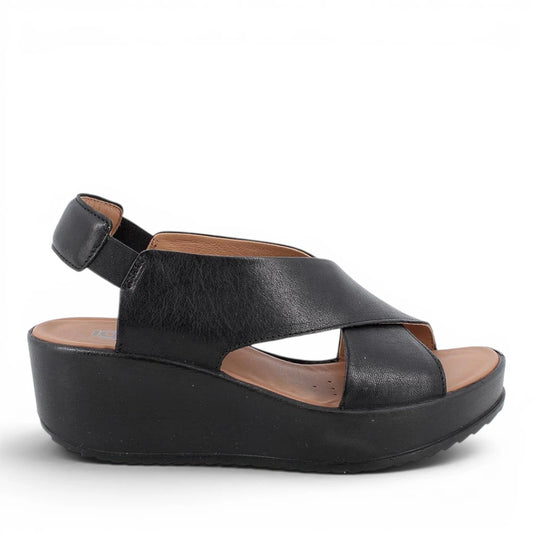 Sandalo donna Igi&Co Nero in morbida pelle, zeppa bianca comoda e cinturino elastico, sottopiede imbottito in pelle